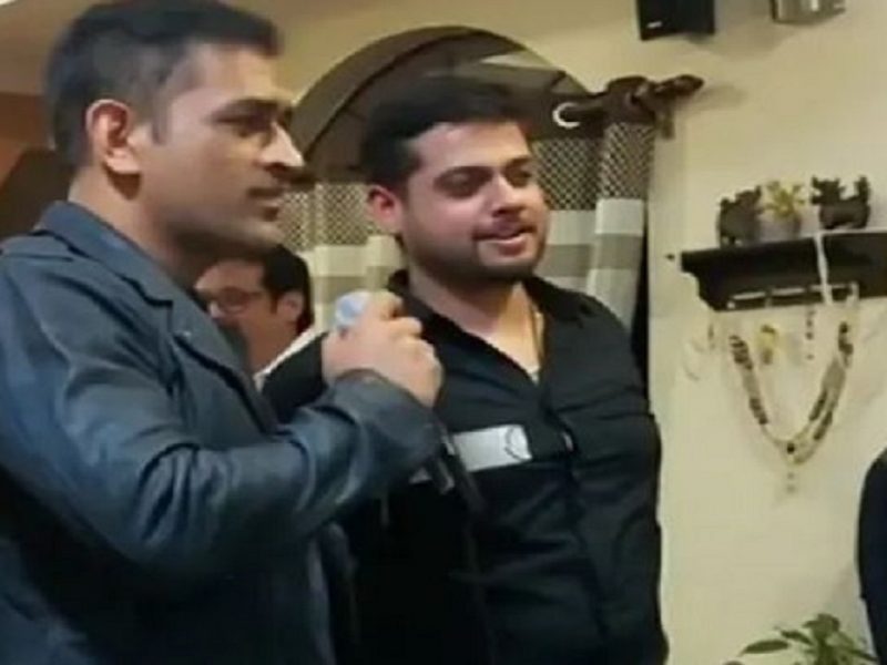 MS Dhoni singing a song