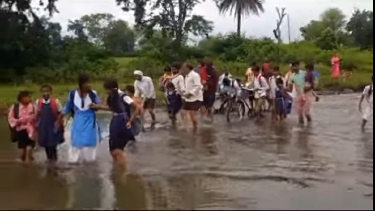 children crossing the raging river
