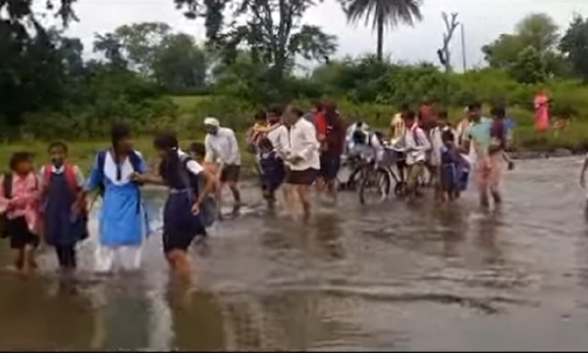 children crossing the raging river