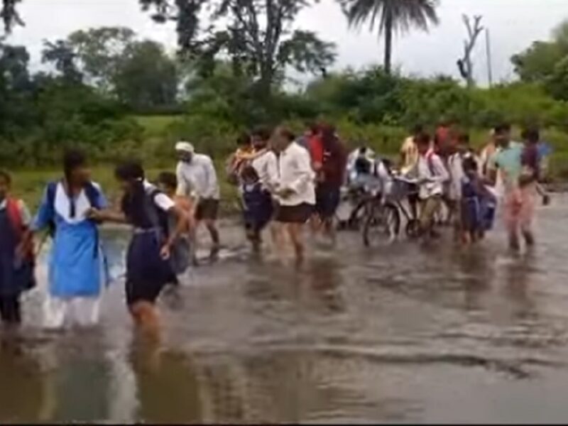 children crossing the raging river
