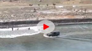 lowered the boat into the river